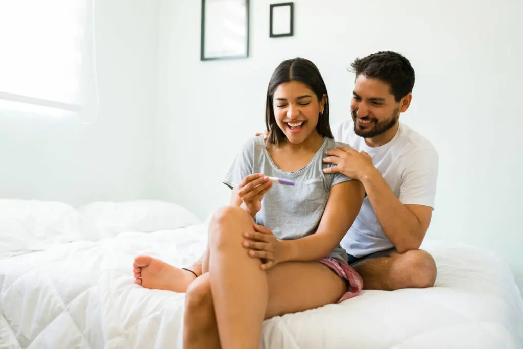 Couple check their Pregnancy Test